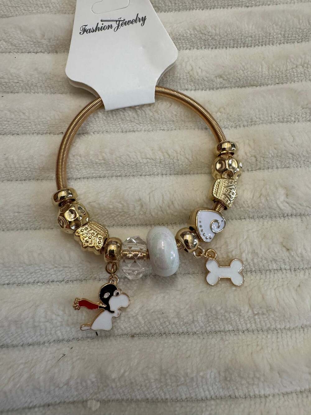 Snoopy red Baron charm gold bracelet with white & gold beads stretchy